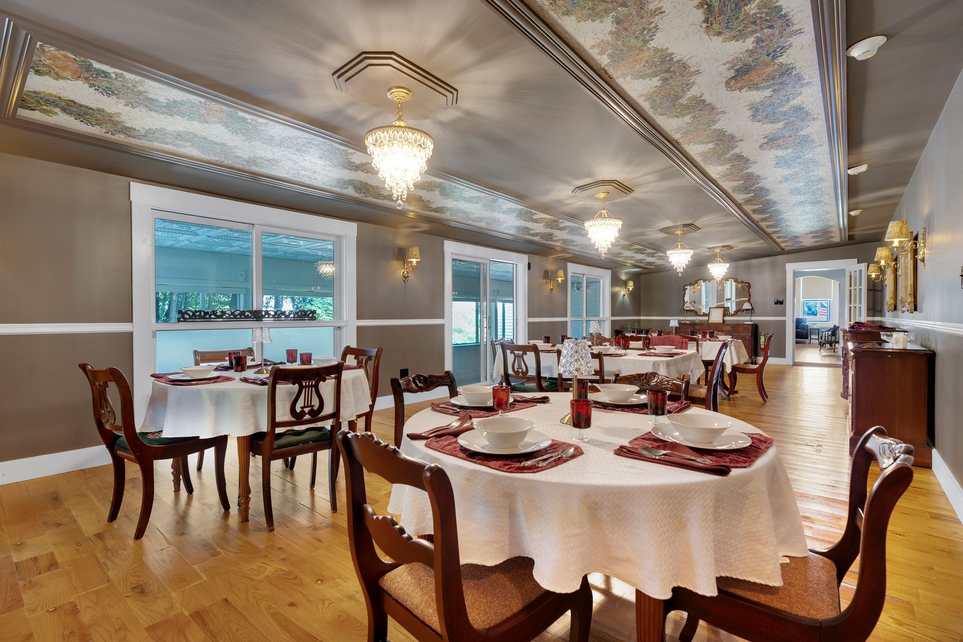 A sunset over a mountain range with a lot of fog