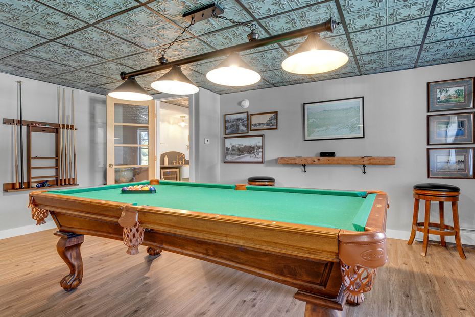 A sunset over a mountain range with a lot of fog