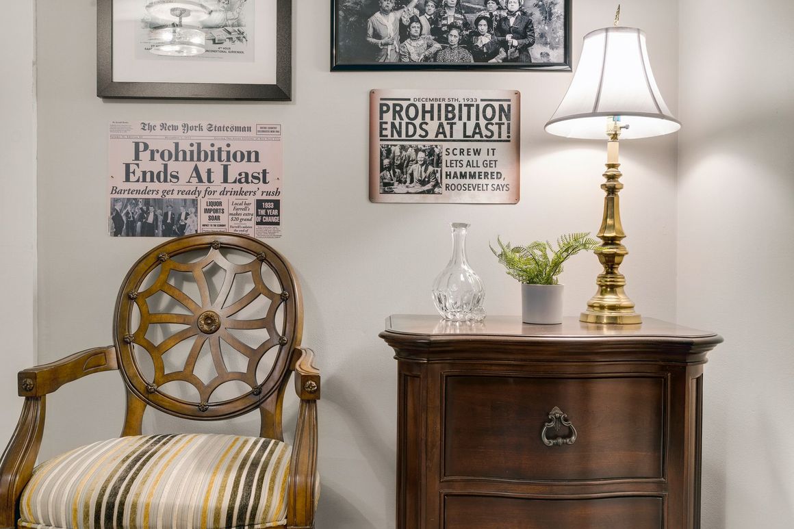 A sunset over a mountain range with a lot of fog