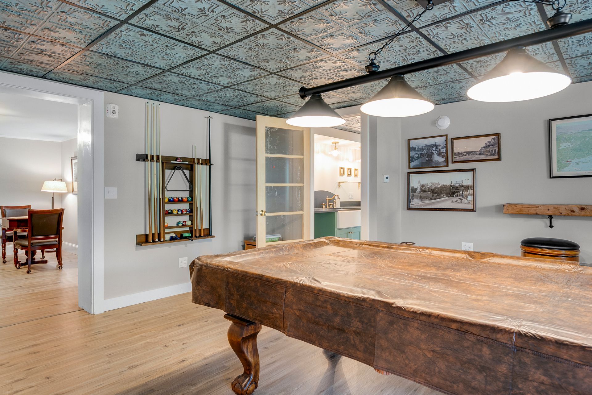 Game room with a pool table, and a decorative ceiling.