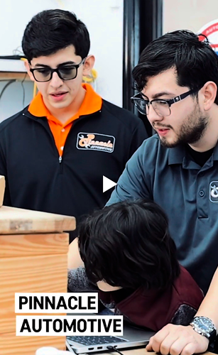 Team at work at front desk in Madison, TN | Pinnacle Automotive