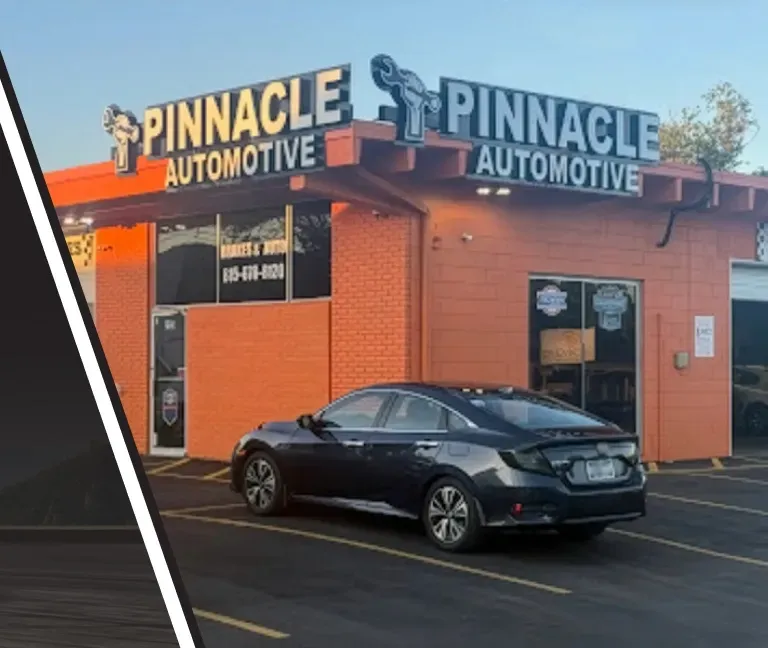 Black car parked outside our shop in Madison, TN | Pinnacle Automotive