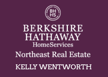 A sign for berkshire hathaway home services northeast real estate kelly wentworth