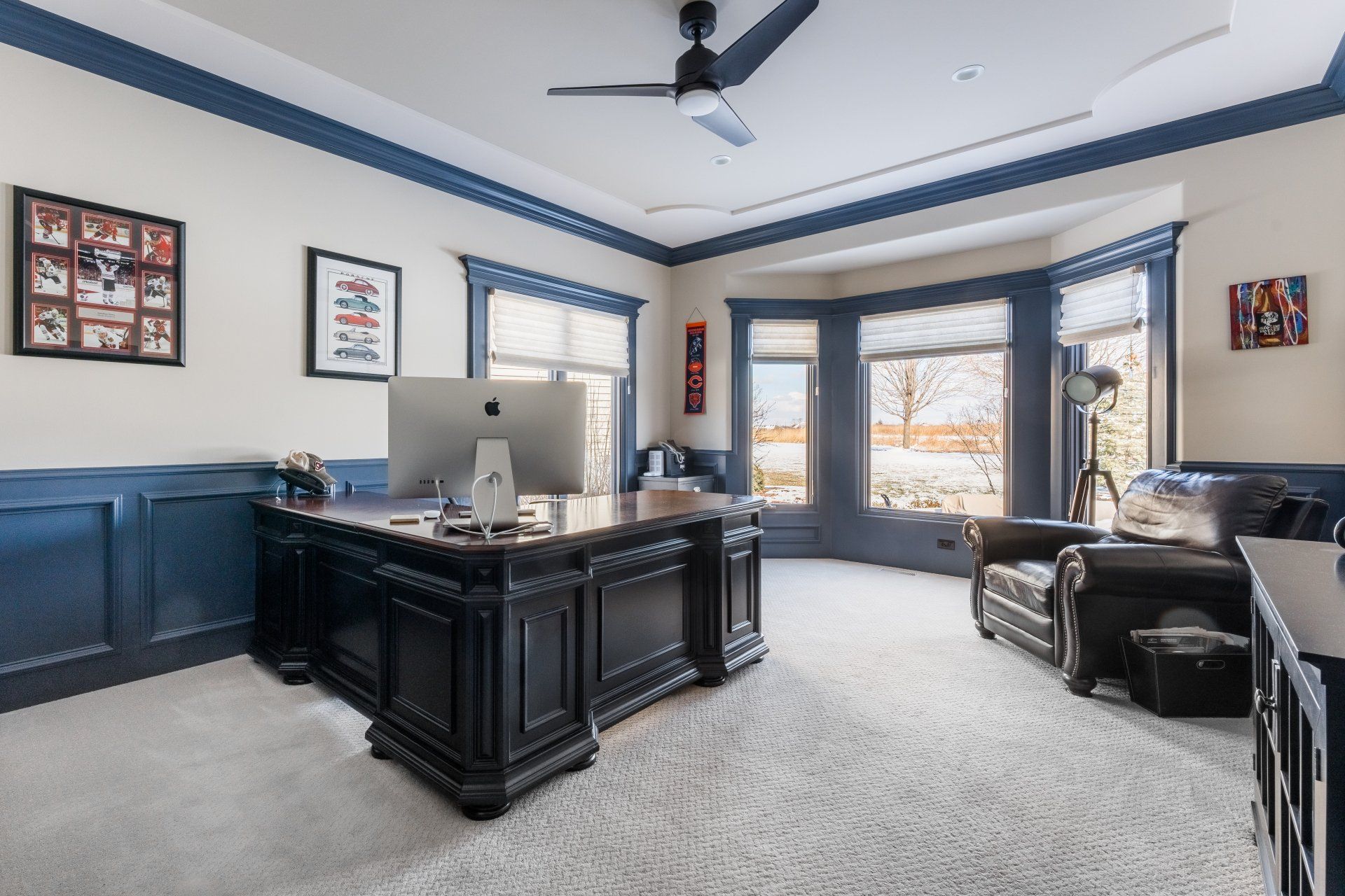 A home office with a desk and a computer on it