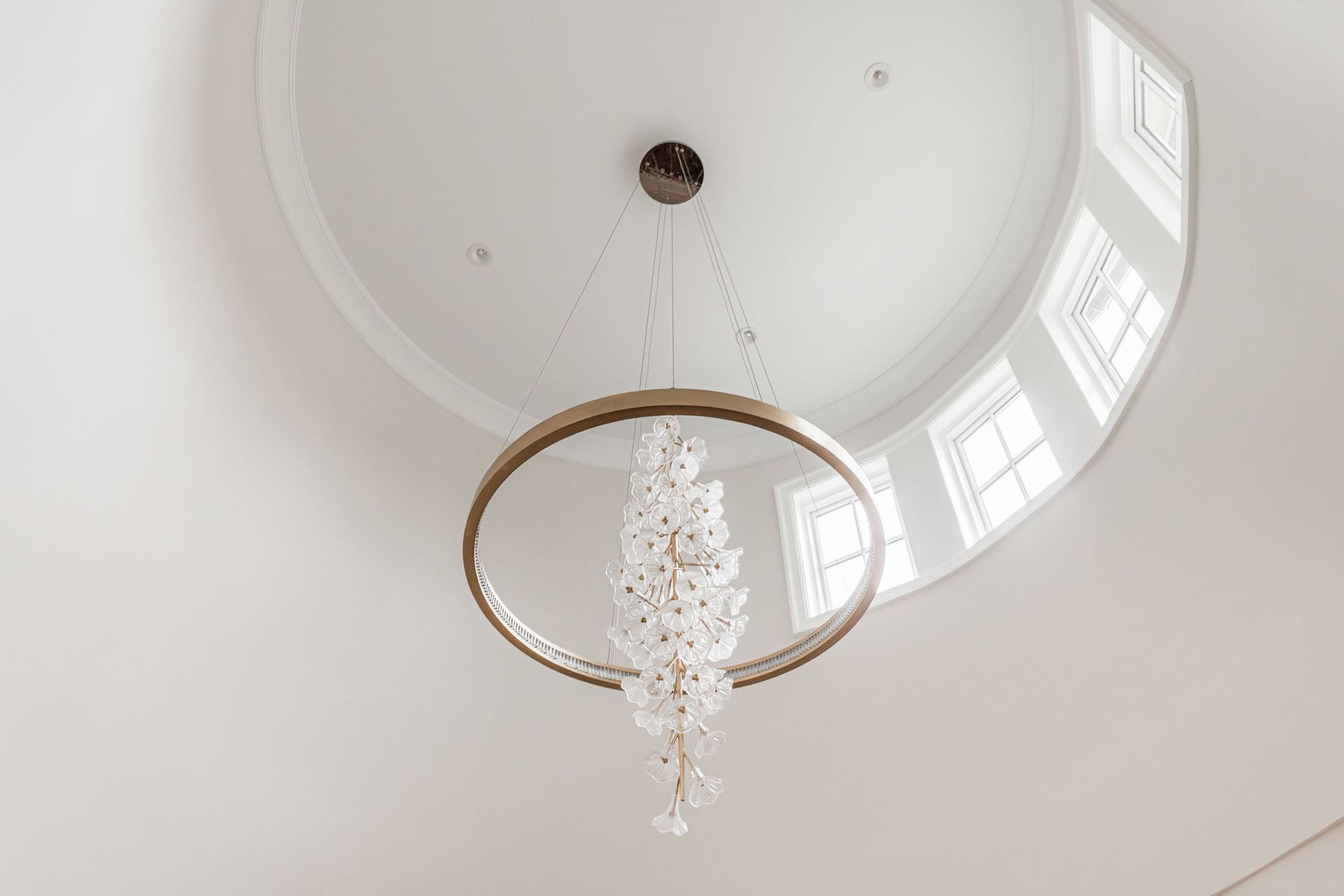 A bathroom with two sinks and two mirrors.