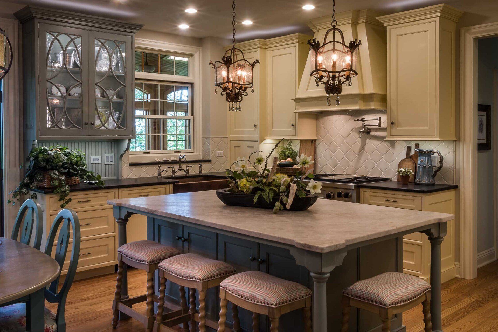 There is a large island in the middle of the kitchen.