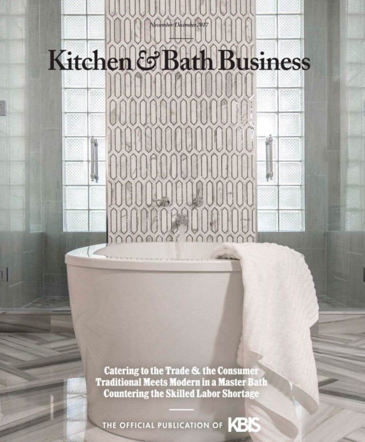 A kitchen and bath business magazine with a bathtub on the cover