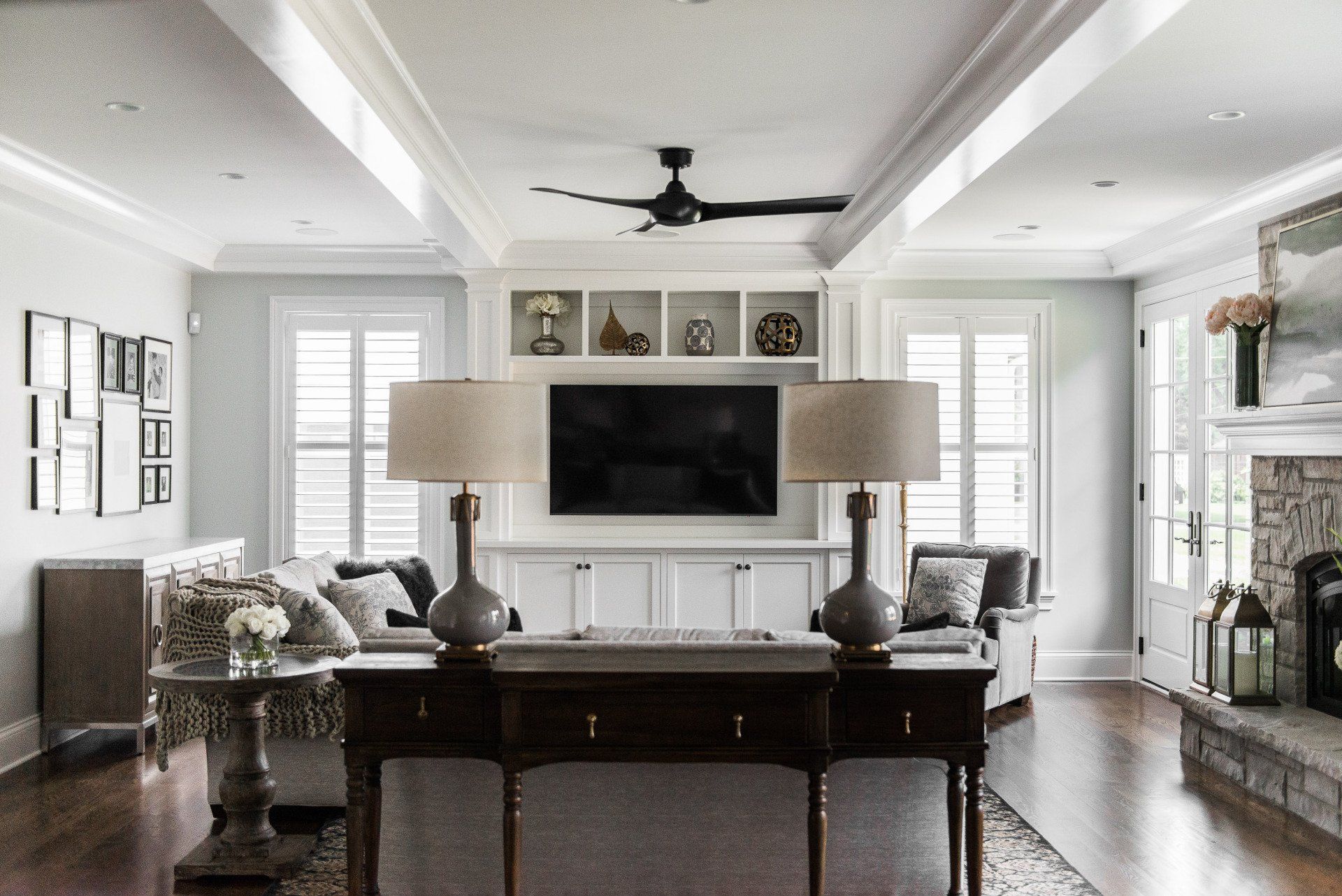 A living room filled with furniture and a flat screen tv.