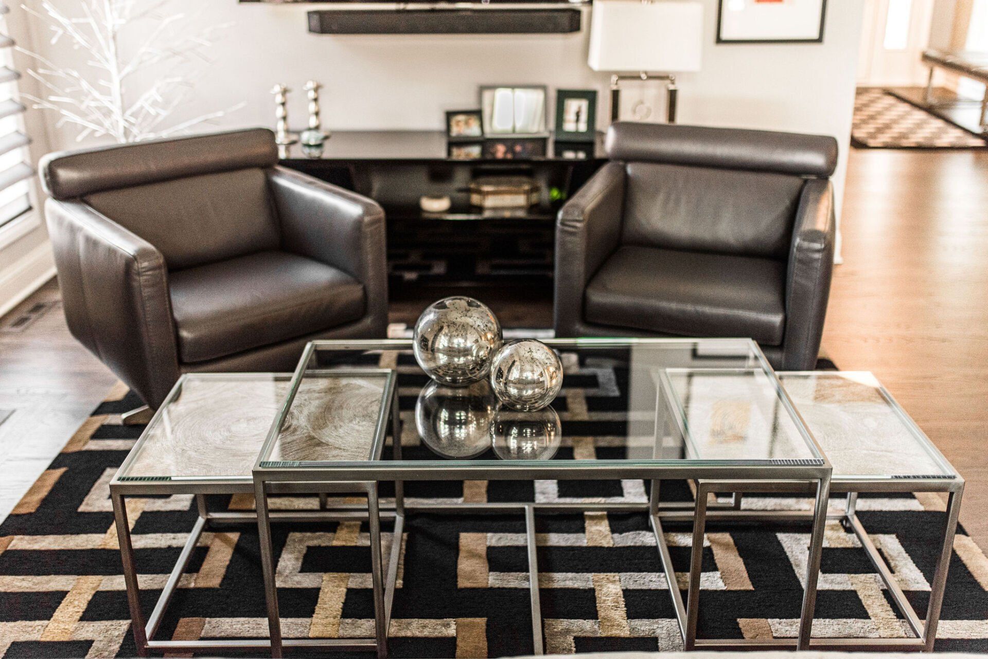 A living room with two chairs and a coffee table
