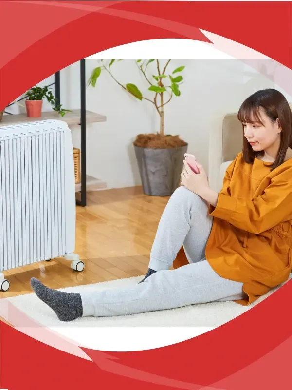 Homeowner sitting in cold home waiting for furnace repair