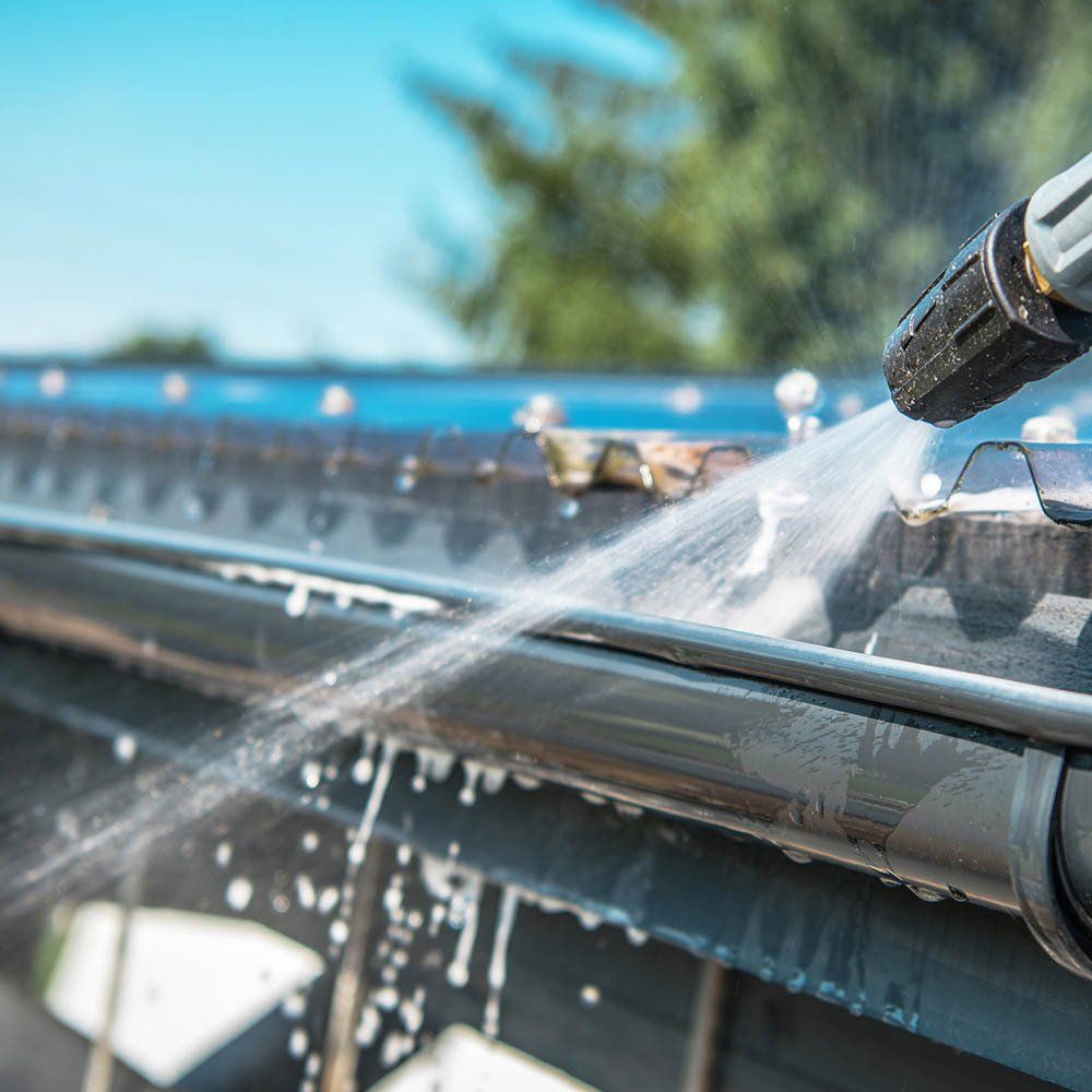 High Pressured Water To Clean The Gutter — Springfield, IL — Midwest Power/Soft Washing