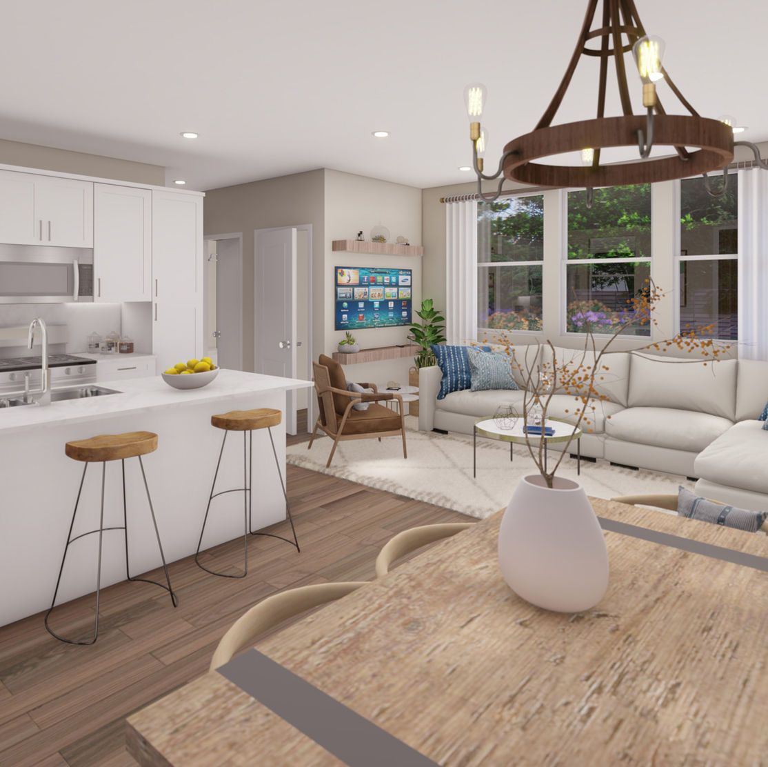 Modern open-concept living space with kitchen island, dining table, and living area with couch and large windows.