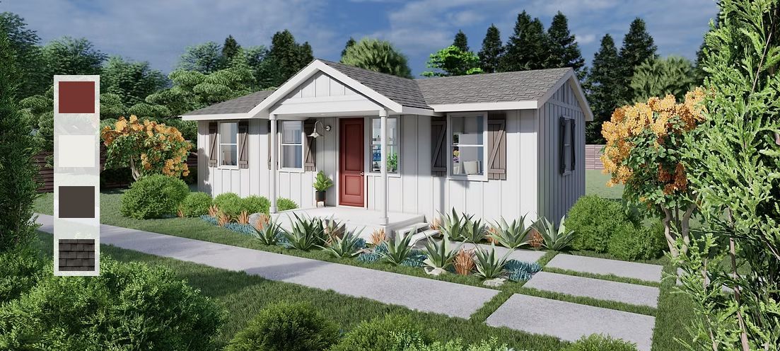 A white house with a red door, gray roof, and a stone pathway surrounded by greenery.