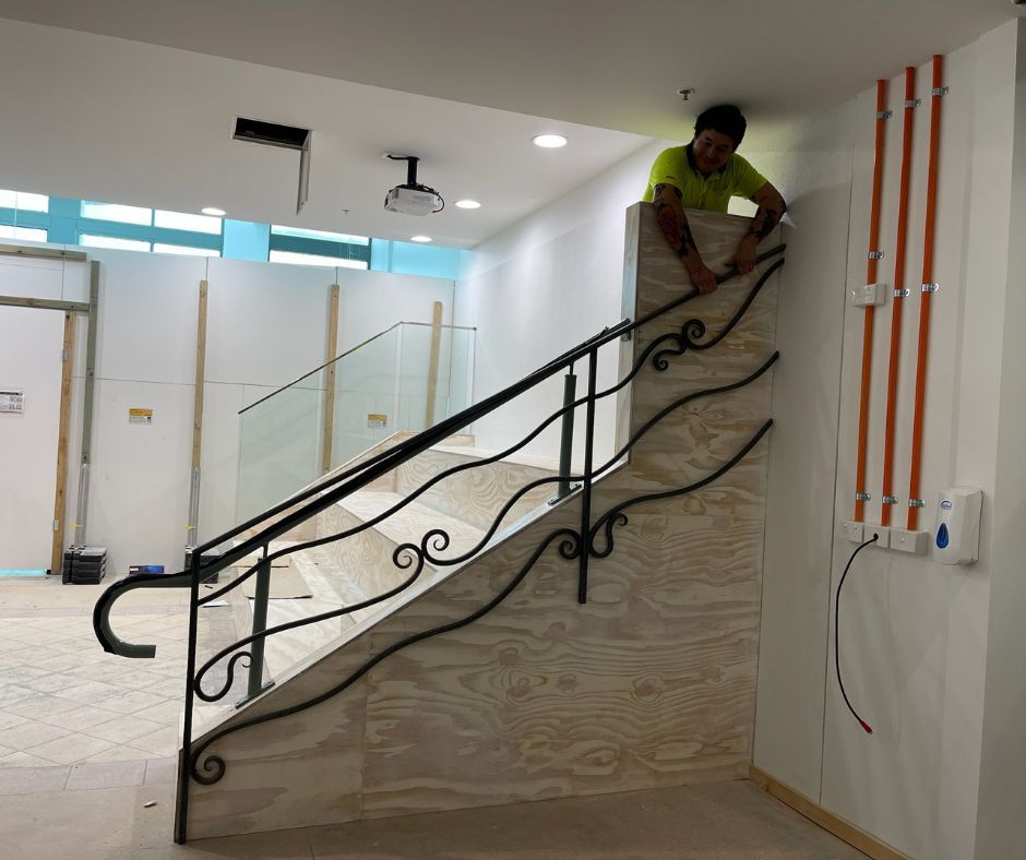 Laity Building team fitting out an office staircase
