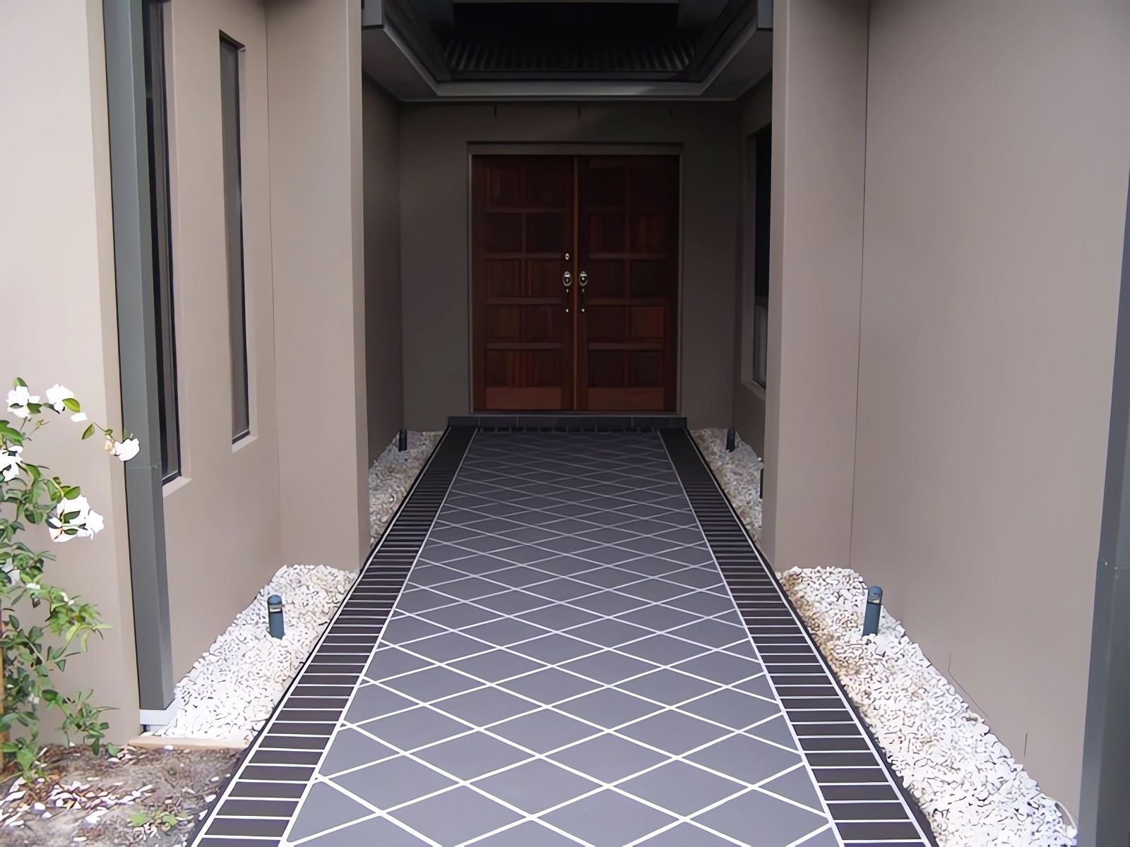 Narrow Walkway With Gray Patterned Tile — Concrete Colour Solutions in Denman, NSW