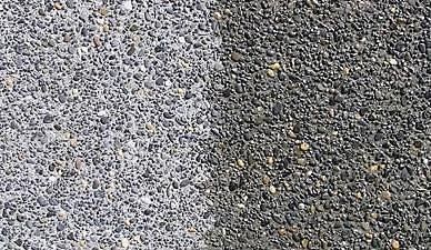 A driveway leading to a house with a garage. — Concrete Colour Solutions in Morisset, NSW