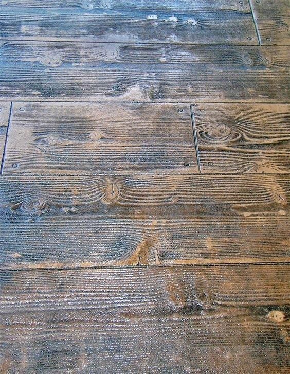 A close up of a wooden floor that looks like a wooden table. — Concrete Colour Solutions in Morisset, NSW