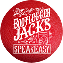 a red button with the words `` bootlegger jacks speakeasy '' on it .