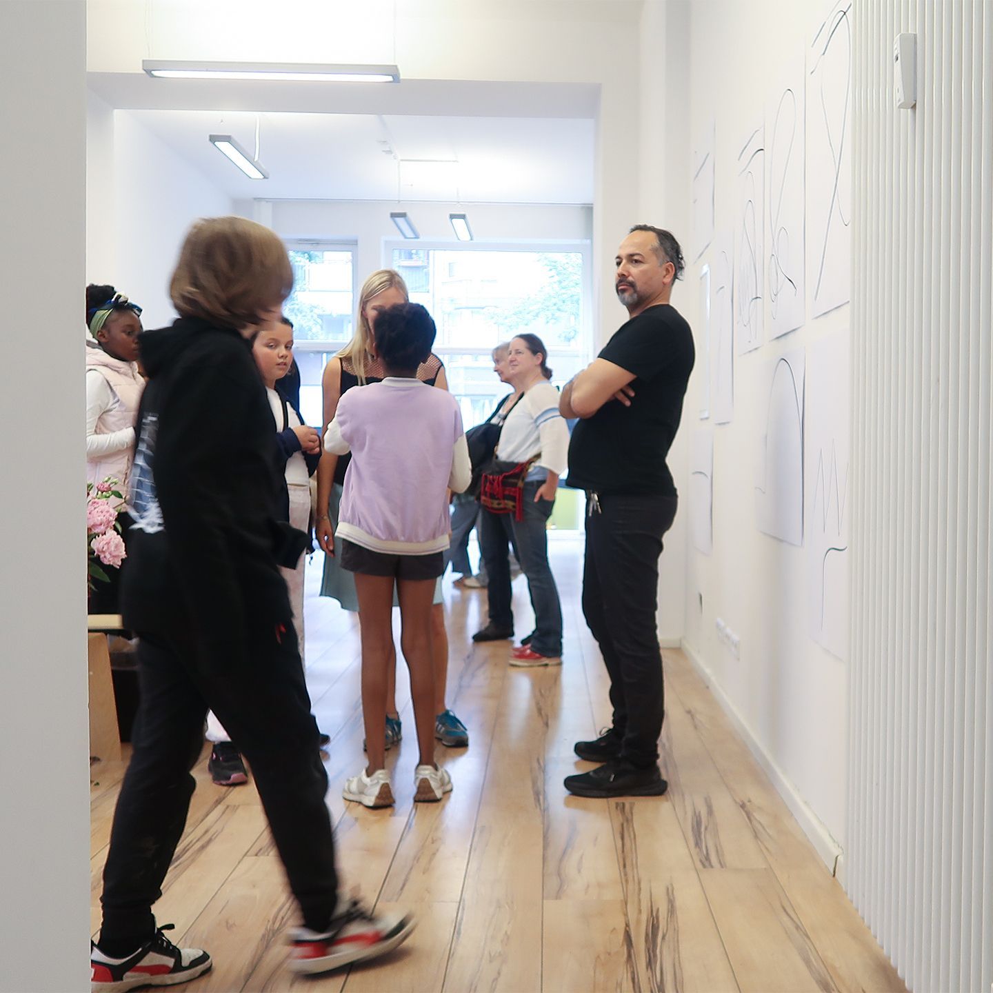 The artist Adrian Luz at the exhibition.