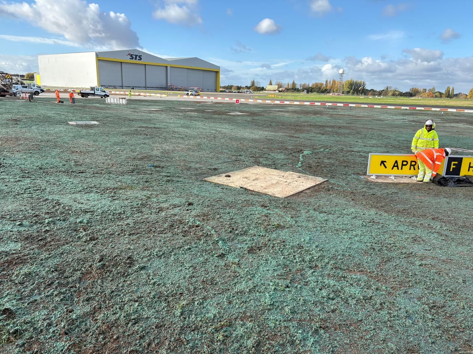 John Deere tractor with stone burier preparing seedbed for conventional seeding