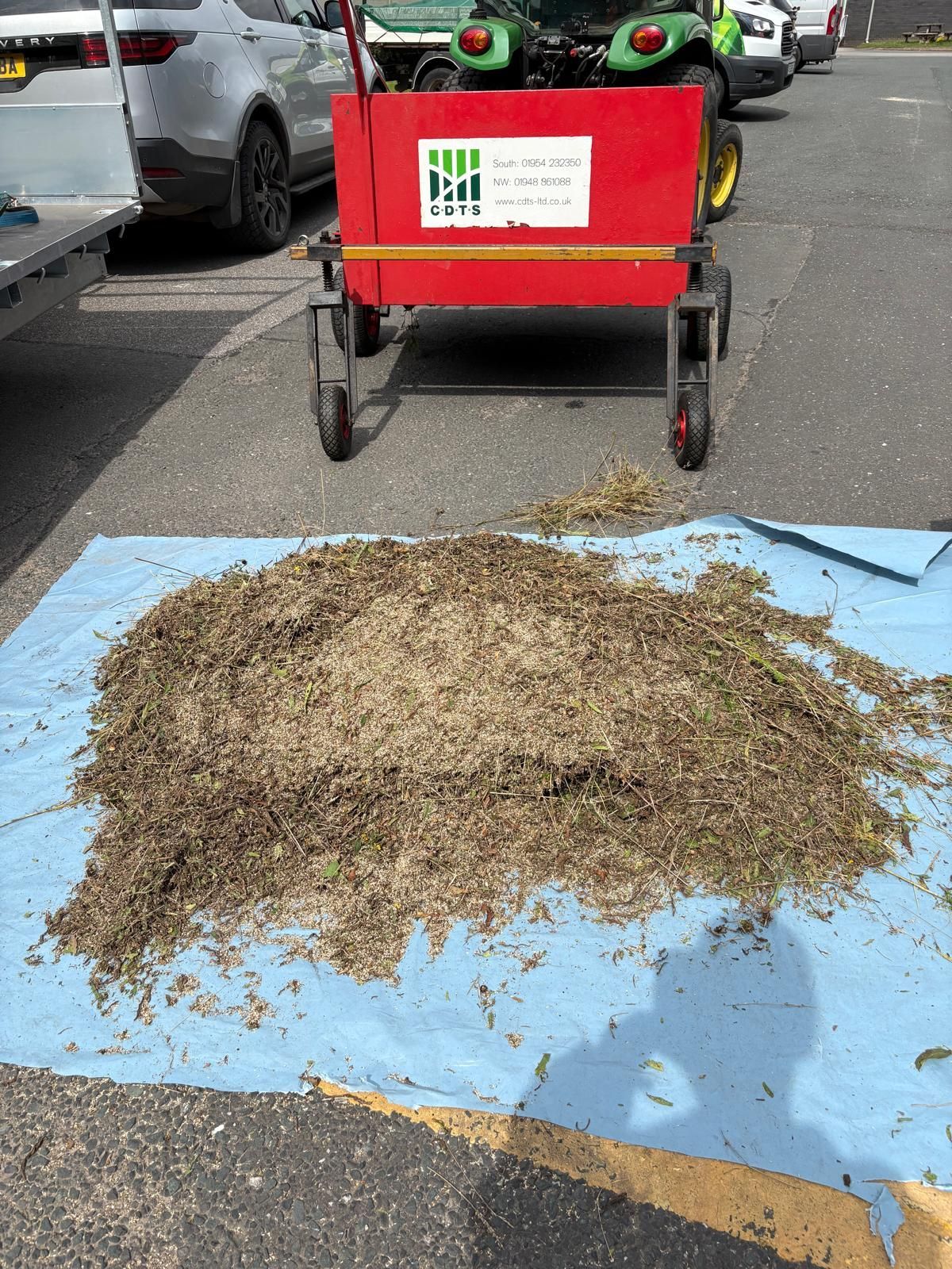 CDTS North & West brush seed harvesting trailer with collection hopper on site