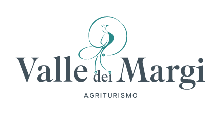 Logo dell'agriturismo Valle dei Margi con icona di albero color verde acqua e testo serif grigio