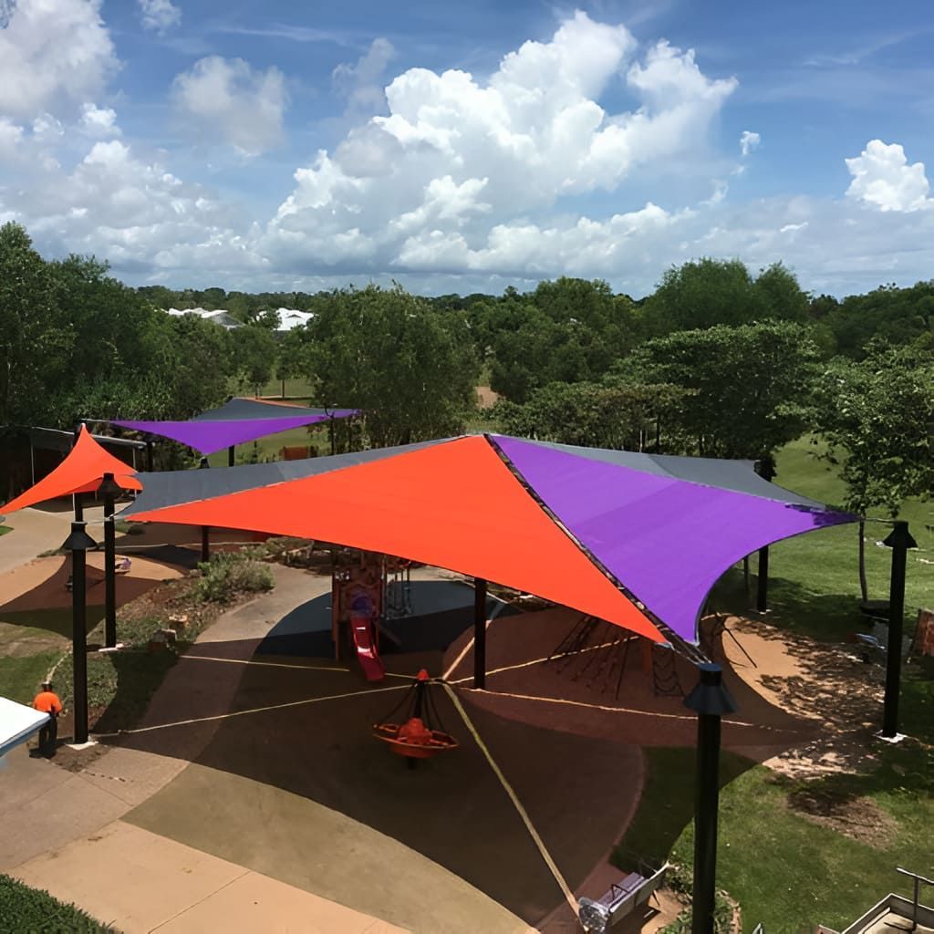 A Purple And Orange Shade Sail Covering A Park — Aerosail Engineered Fabric Structures In Winnellie, NT
