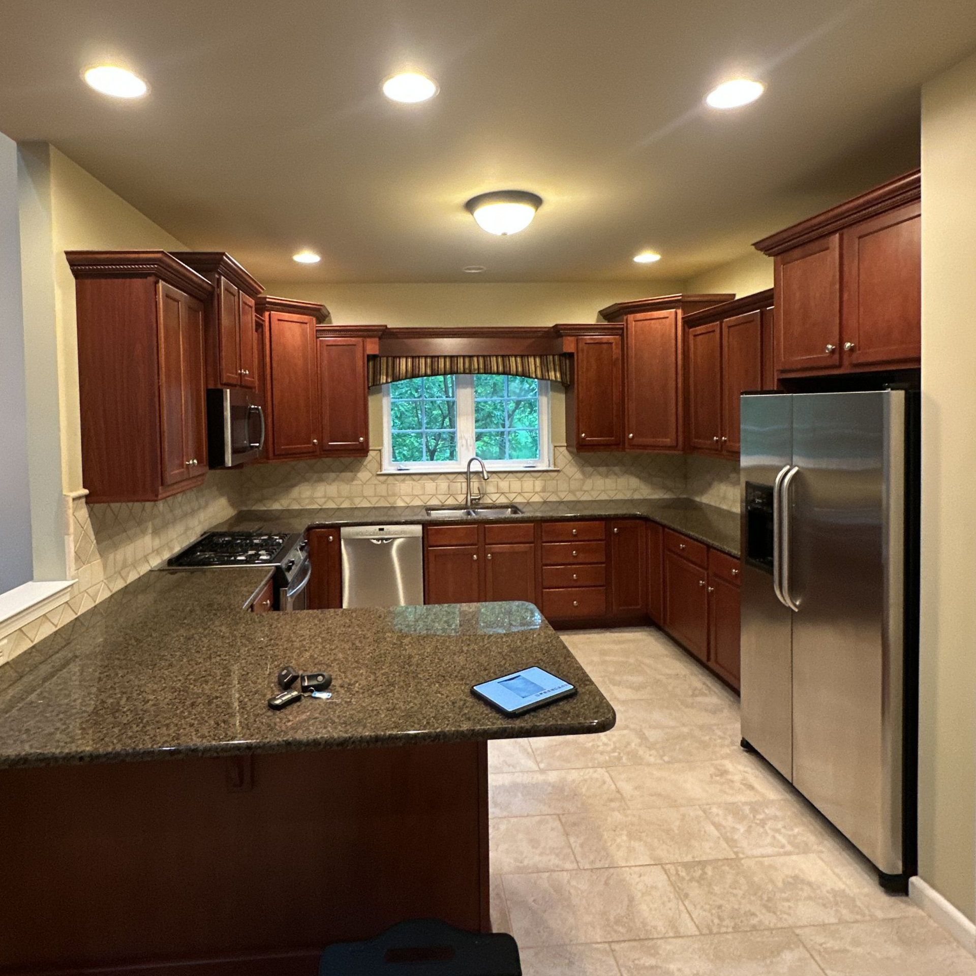 before photo of dark, dated kitchen