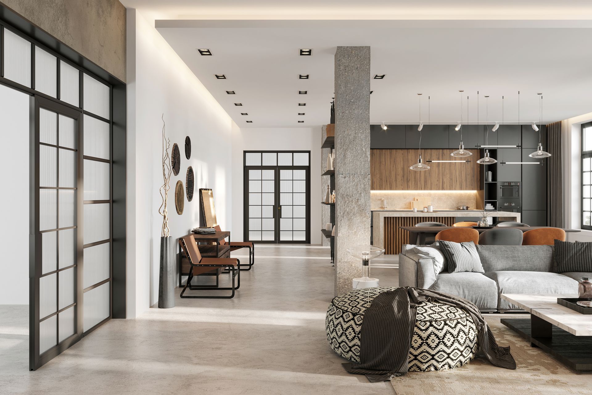 Modern living room with black-framed windows and doors, concrete column, gray sofa, and kitchen in the background.
