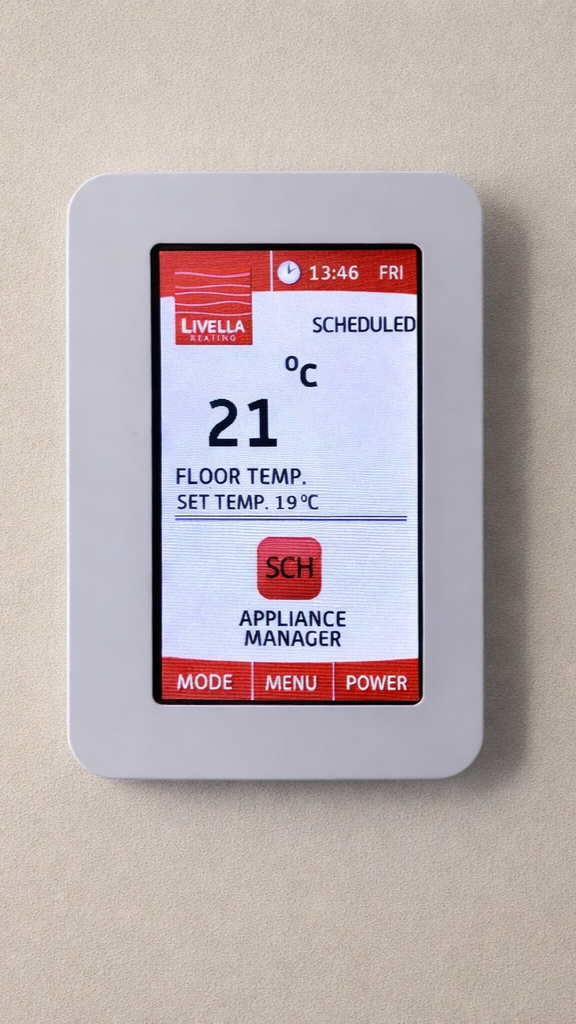 A wall-mounted digital thermostat with a touchscreen showing 21°C floor temperature, set to schedule mode.