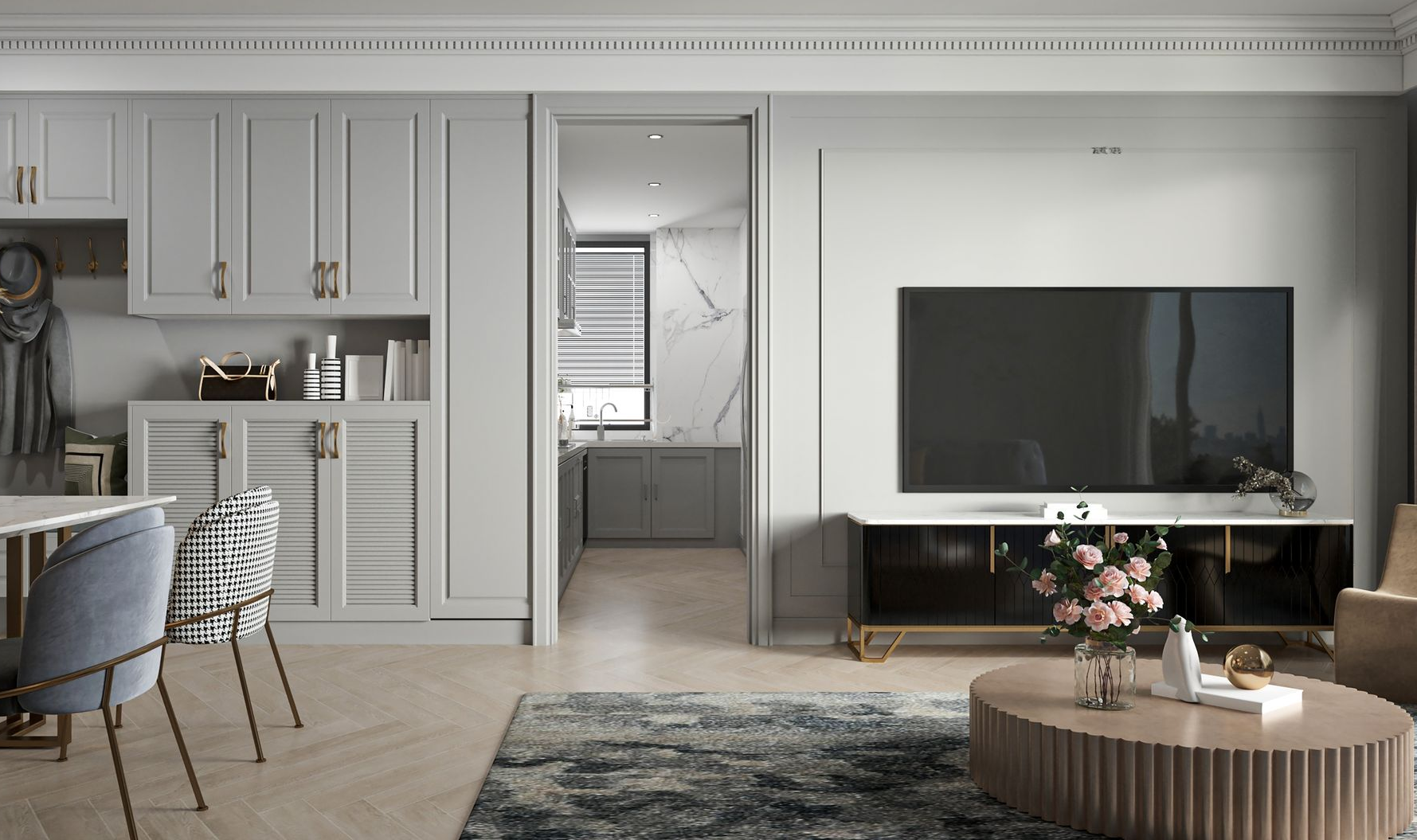 Living room with a gray color scheme, featuring a TV, cabinets, and a view into a kitchen.