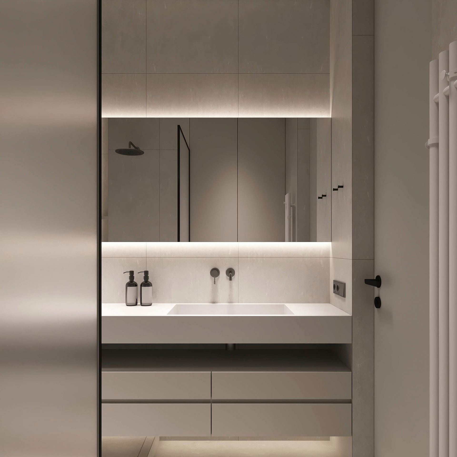 Modern bathroom with a white sink, mirror, and cabinet with built-in lighting.