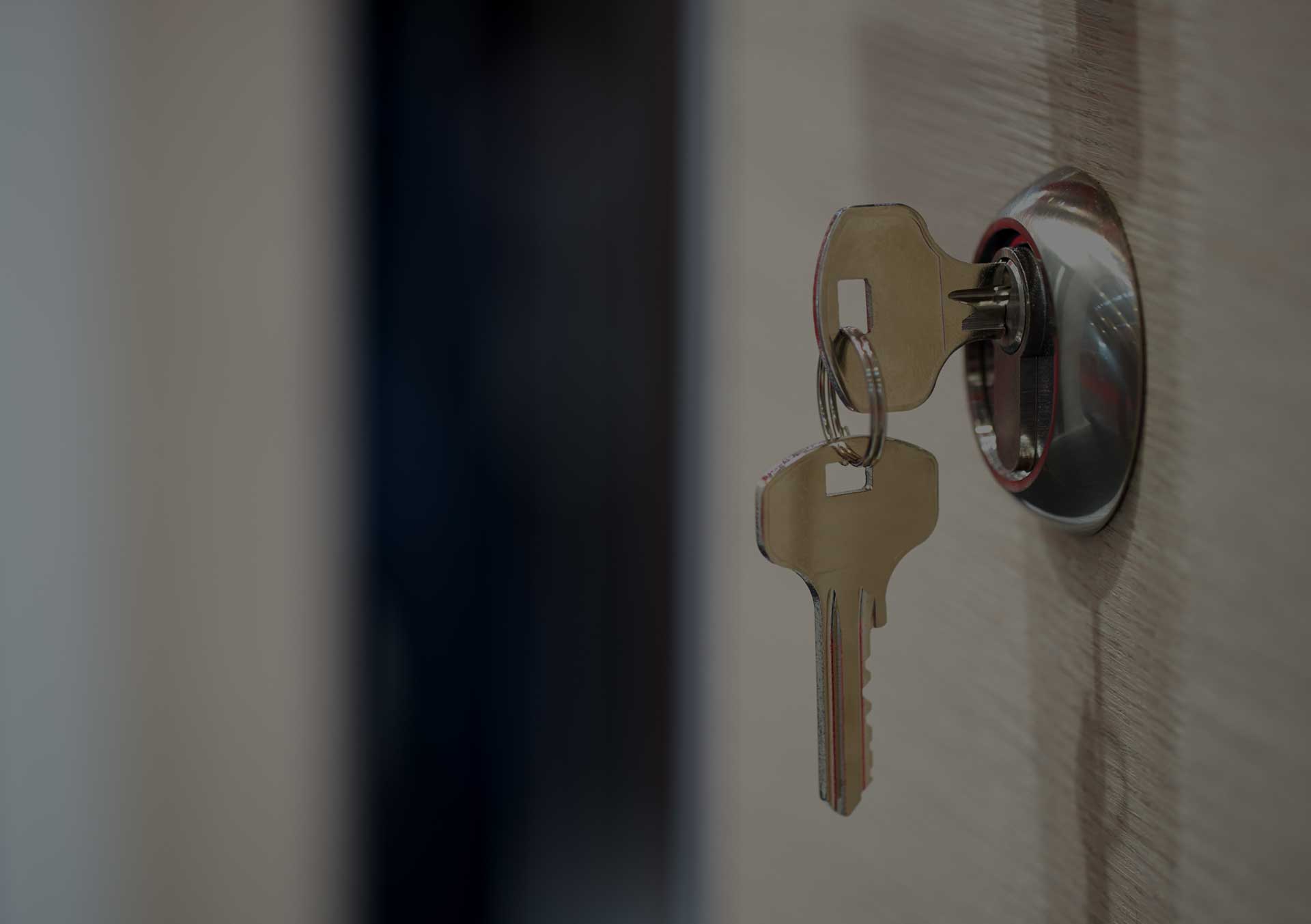 key left hanging in door lock