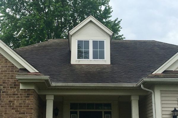 A house with a large window on the roof