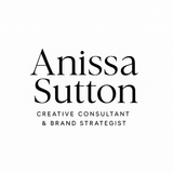 A black and white logo for anissa sutton on a white background.