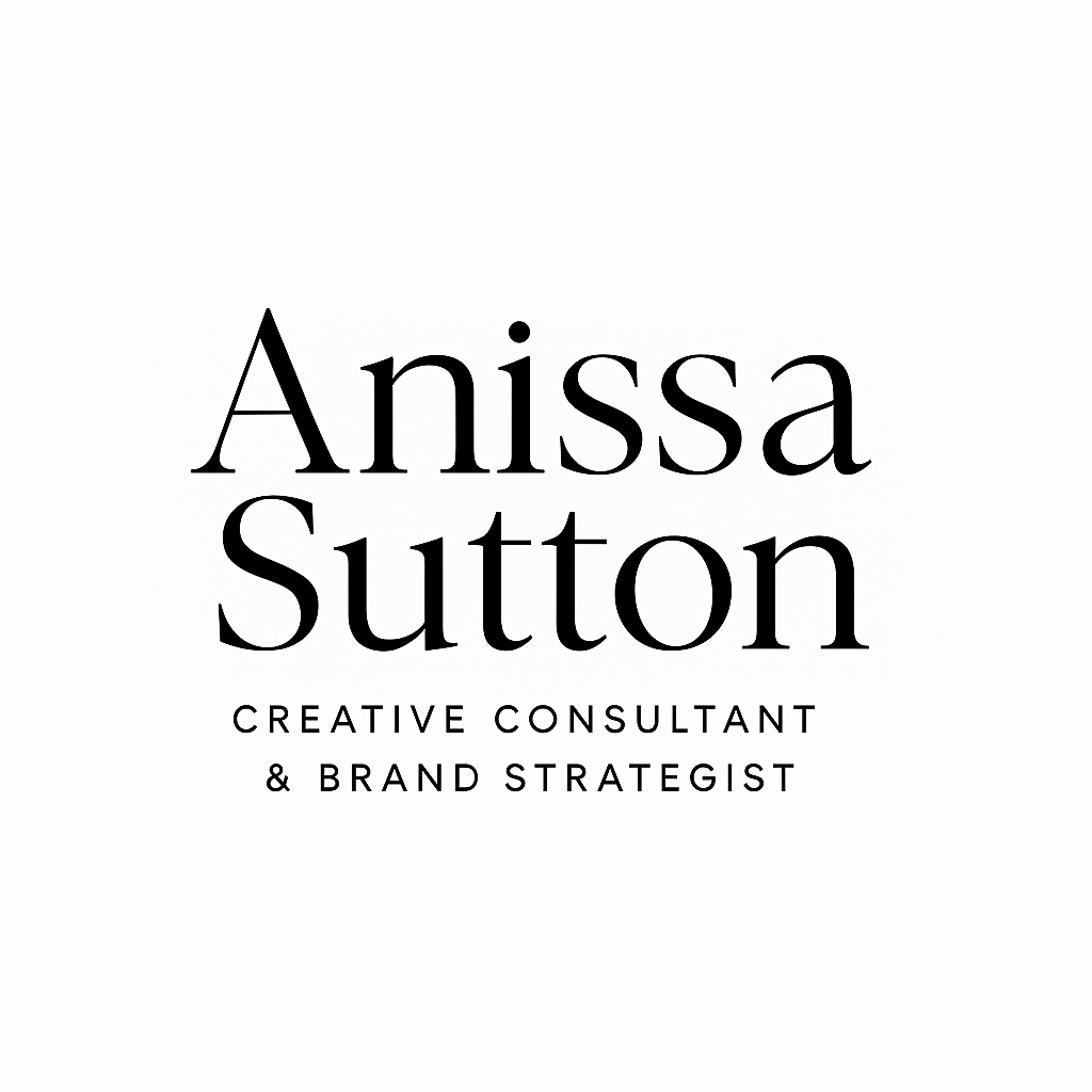 A black and white logo for anissa sutton on a white background.