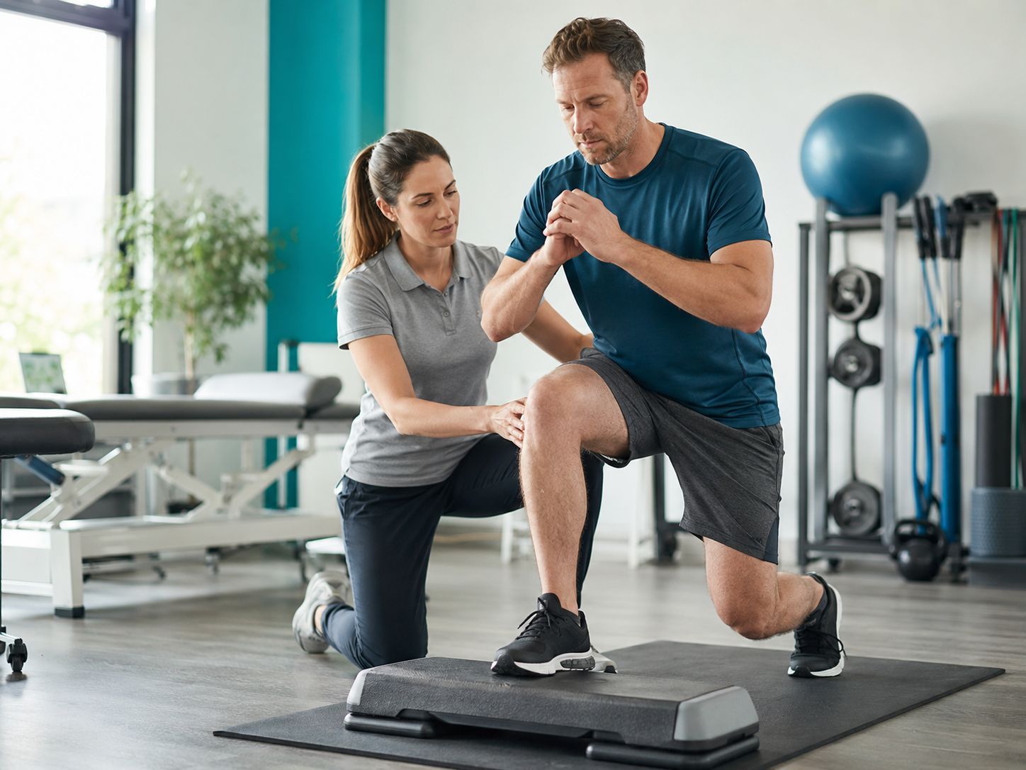 Physiotherapist guiding recurring pain rehabilitation in Mississauga
