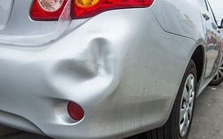 Auto Body Repair — Rear Bumper Dent in Billings, MT