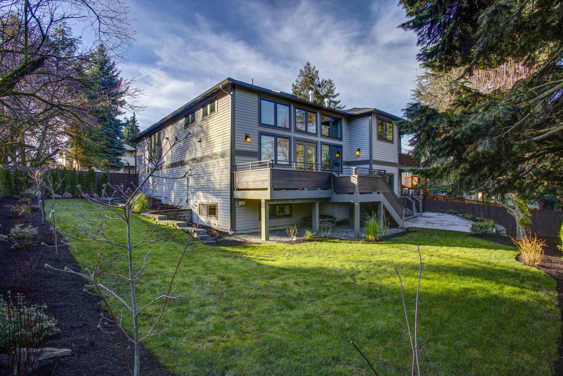 New Construction Home Exterior Boasts Luxury Deck — Spokane, WA — Morris Clark Siding & Roofing