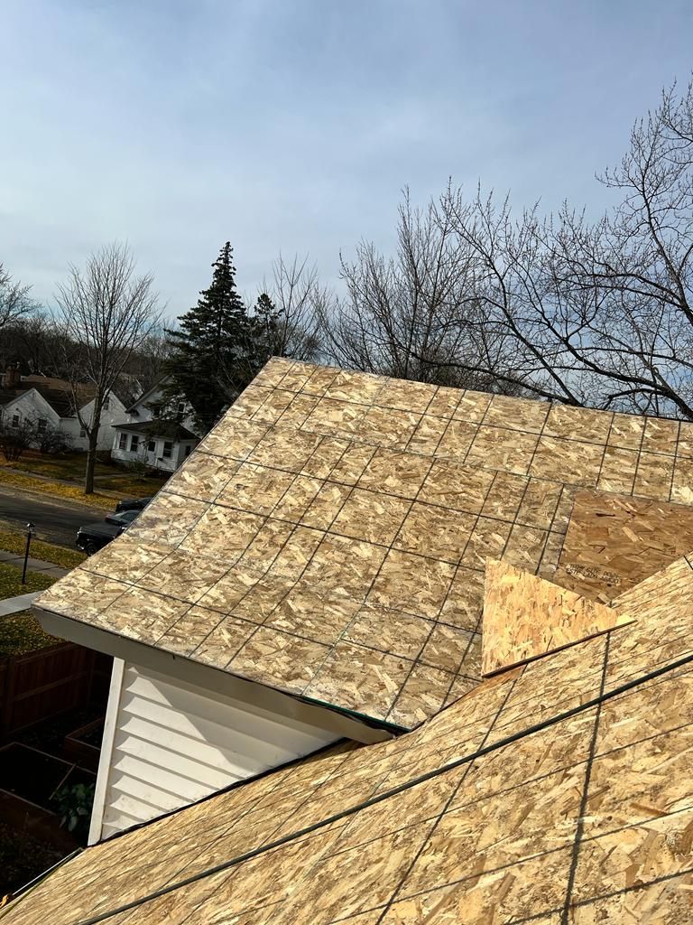 A house with a roof that is being remodeled.