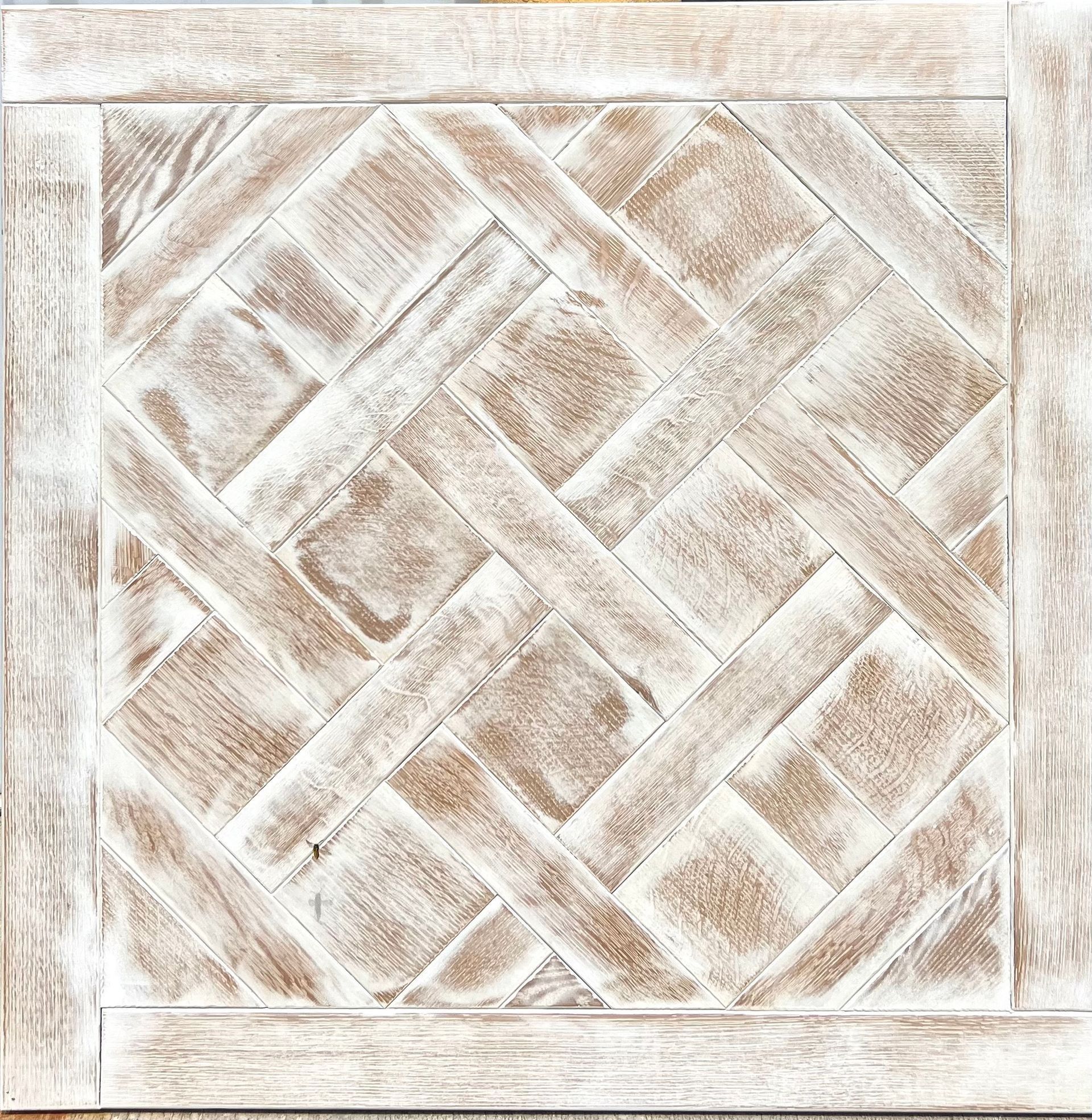 Whitewashed woven wood basket-weave panel with a decorative square border