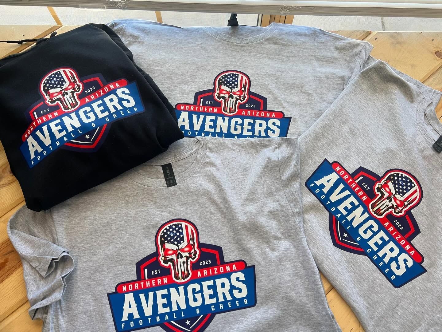 Black sweatshirt and gray t-shirts with