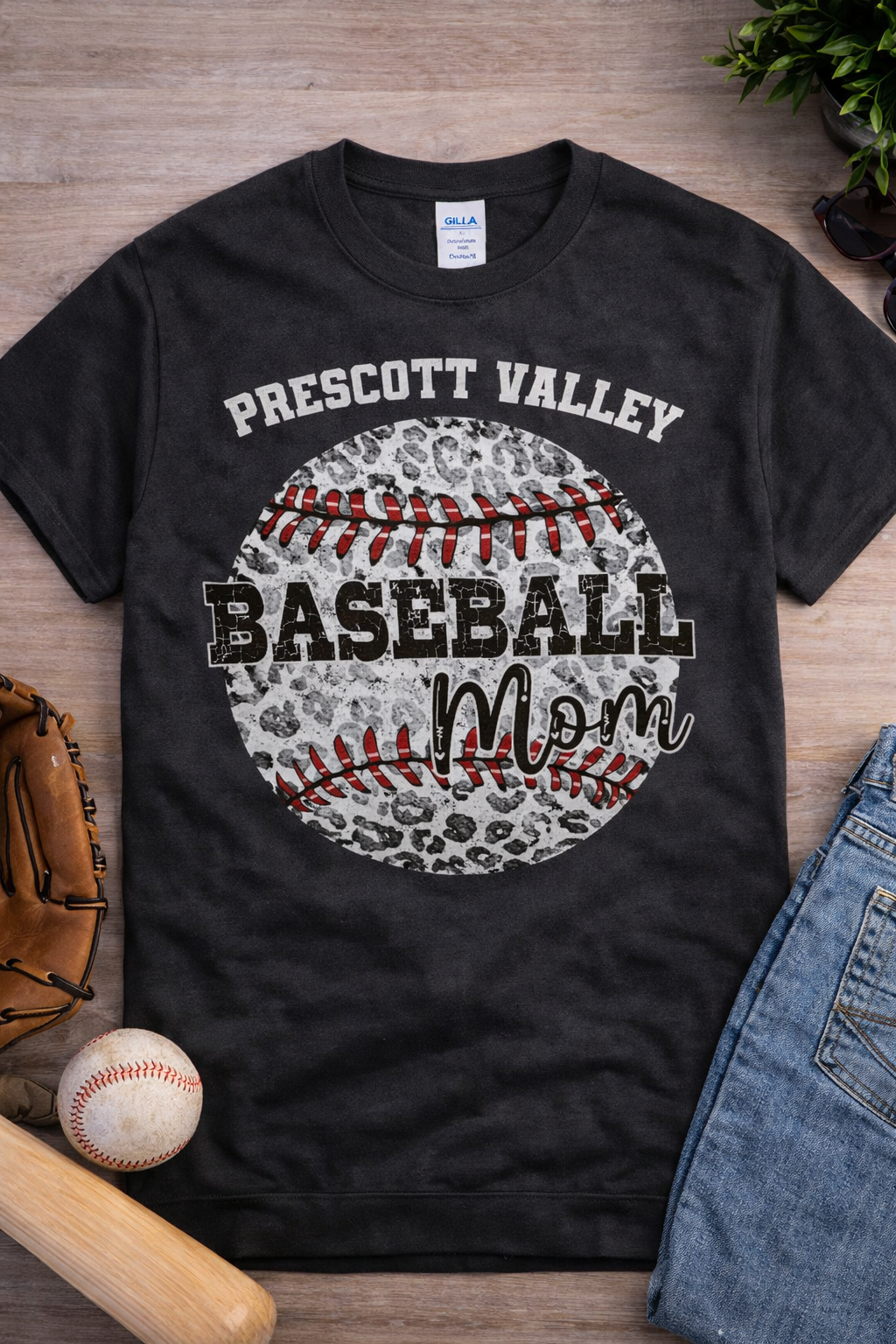 Dark gray t-shirt with a baseball design. Reads 