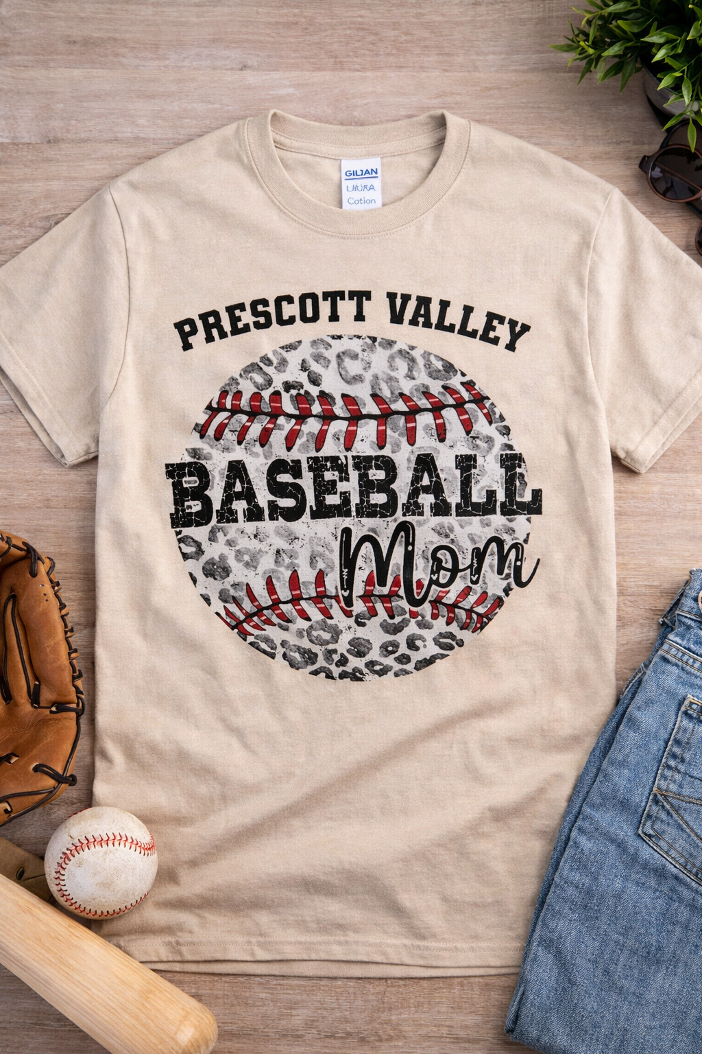 Dark gray t-shirt with a baseball design. Reads 