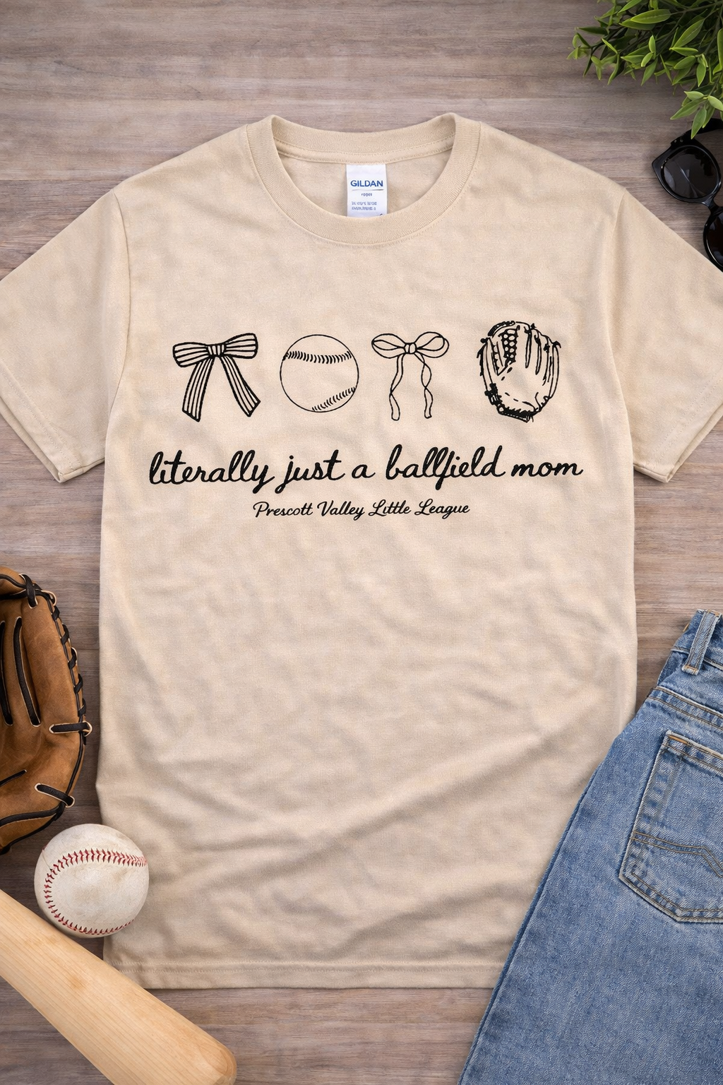 Black t-shirt with baseball-themed graphic and text: 