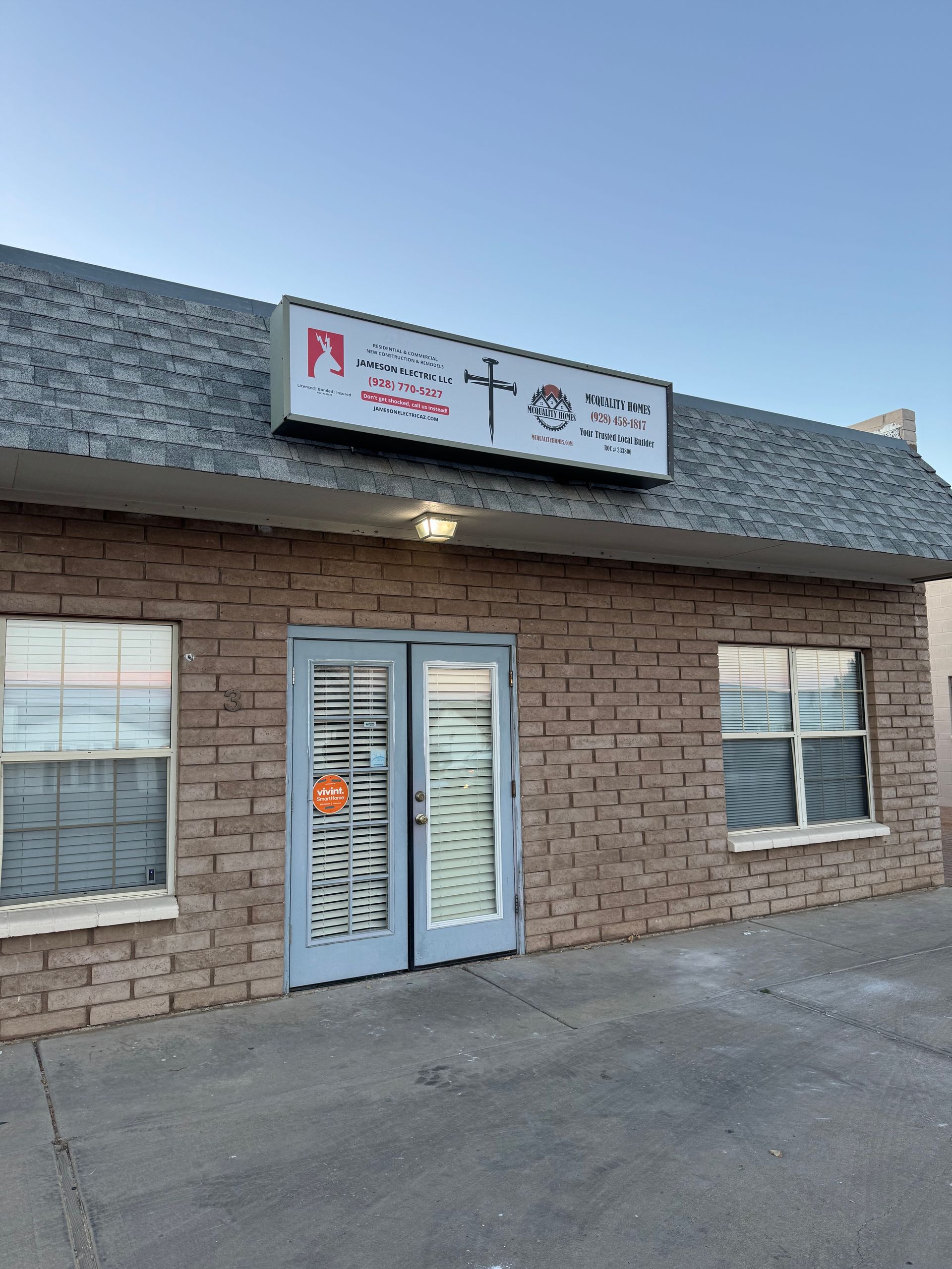 Brick building with sign: 