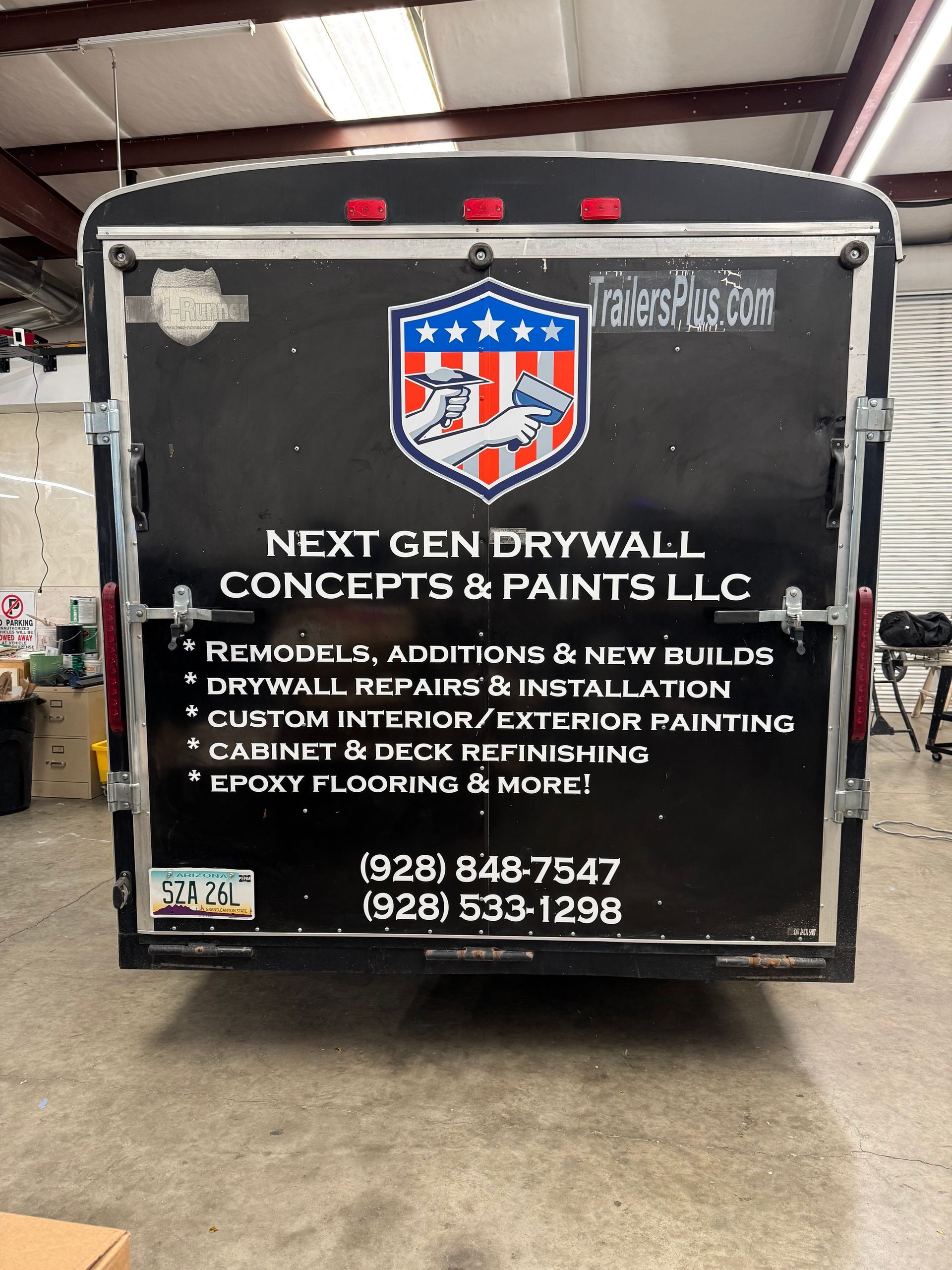 Black trailer with company logo and text for Next Gen Drywall Concepts & Paints LLC, contact info included.