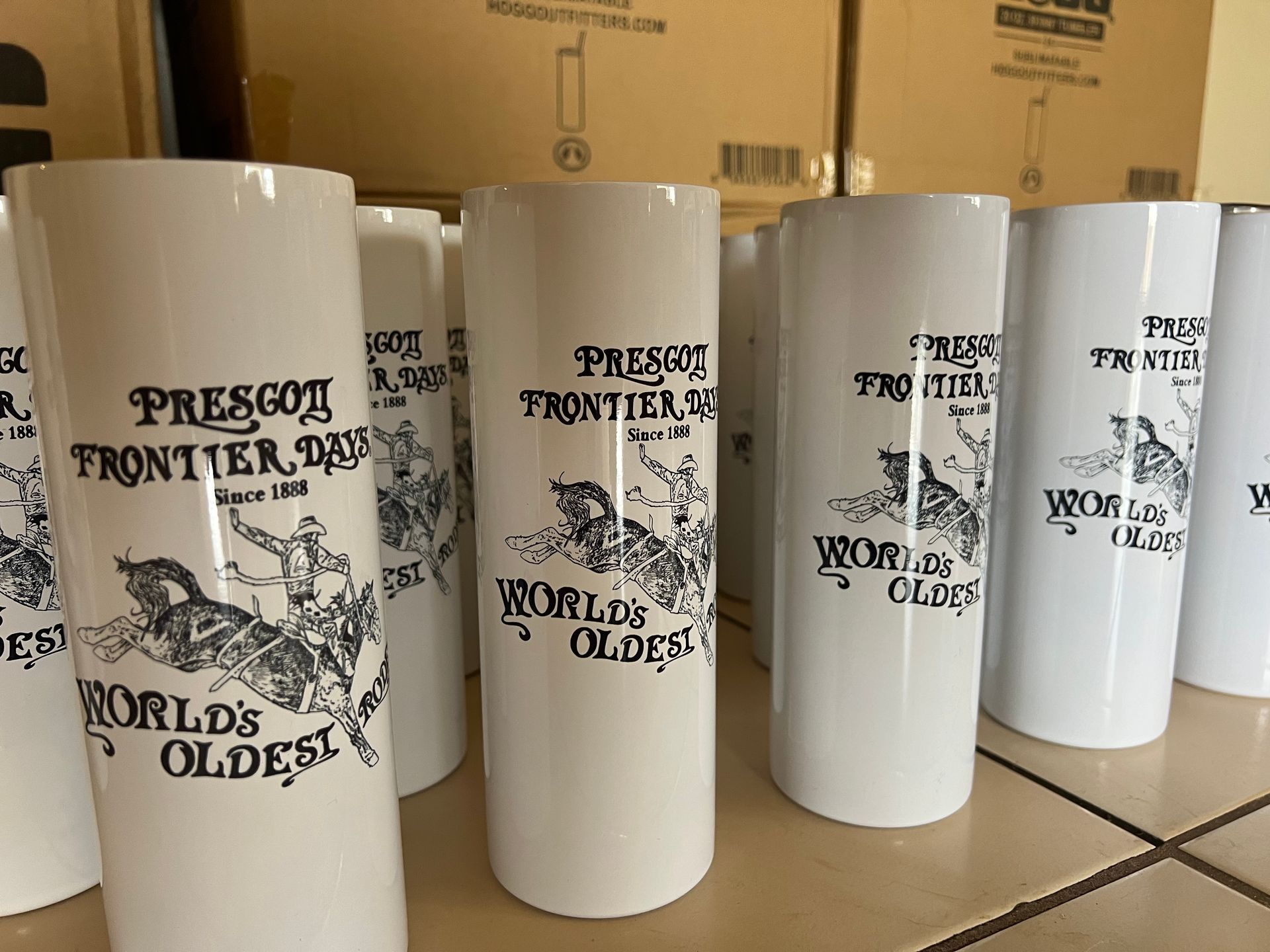 White Prescott Frontier Days commemorative cups.