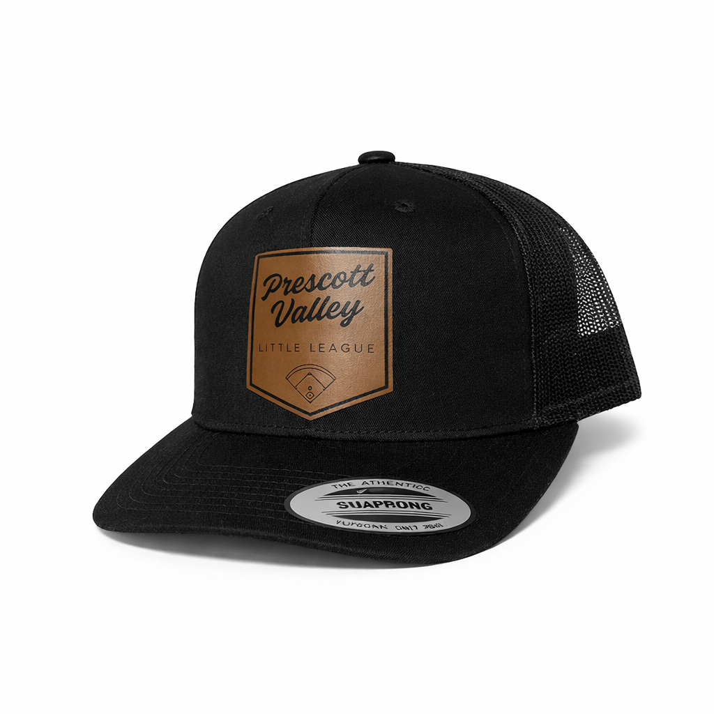 White trucker hat with a brown leather patch that reads 