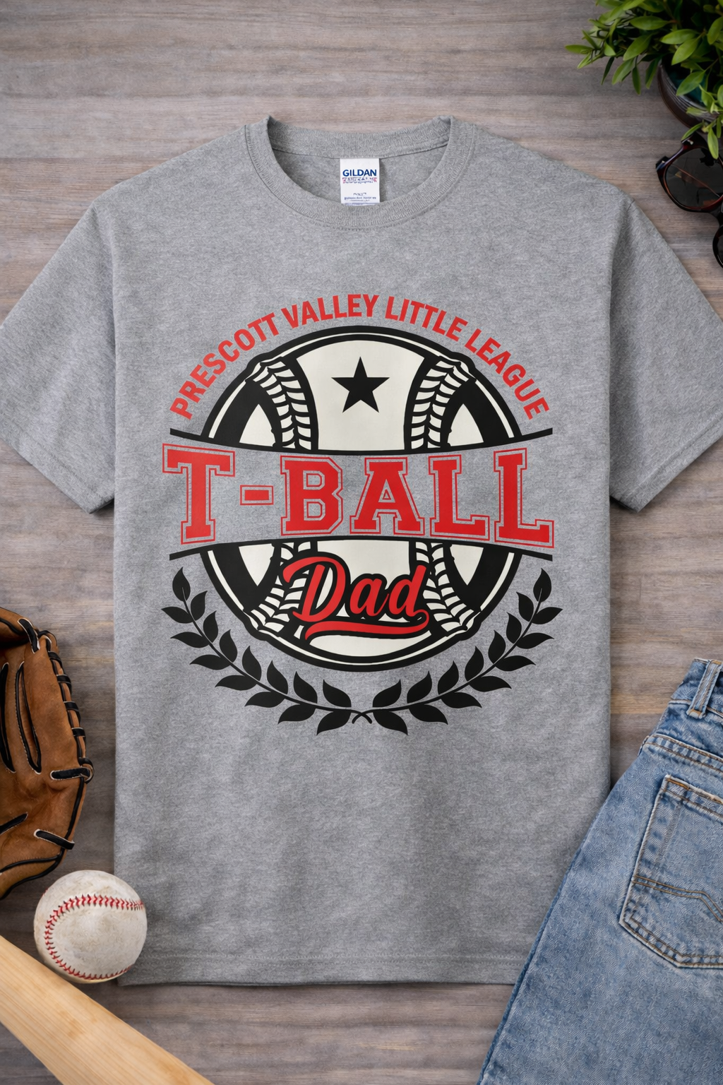 Gray T-shirt with a baseball graphic that says 